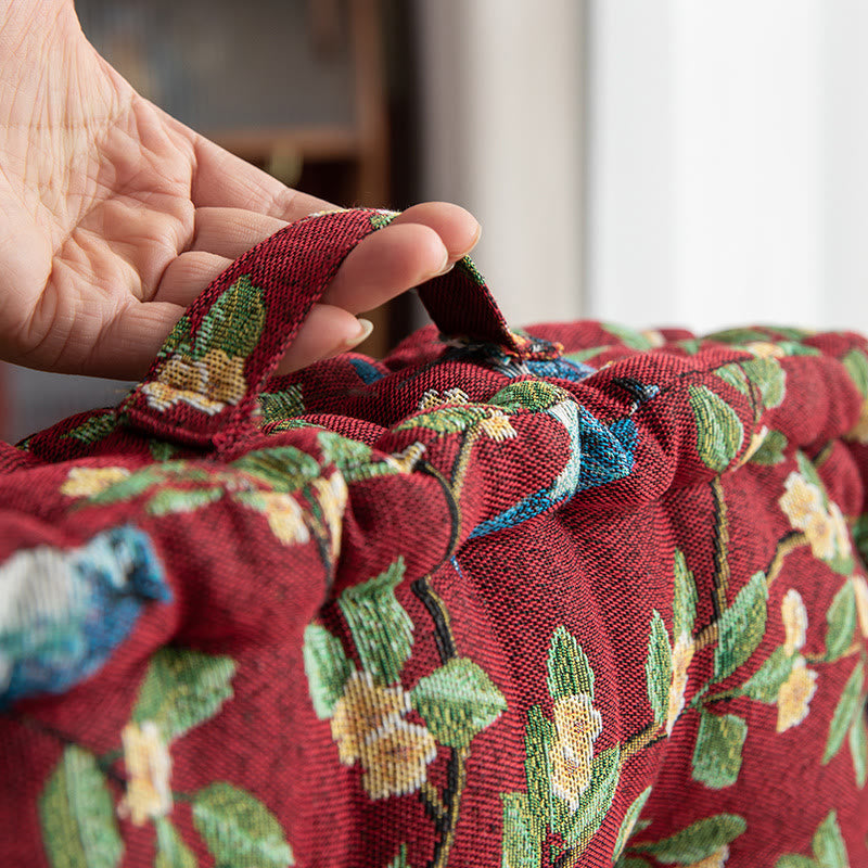 Coussin de chaise et de sol en jacquard motif feuilles d'oiseaux