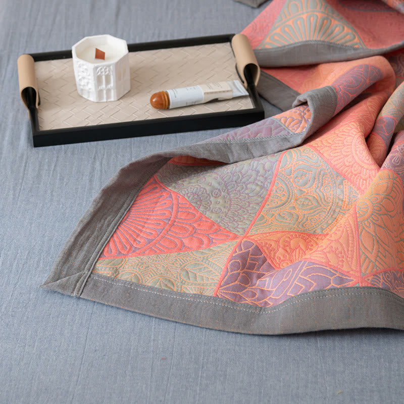 Couette réversible en coton à motif triangulaire