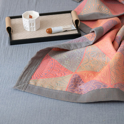 Couette réversible en coton à motif triangulaire