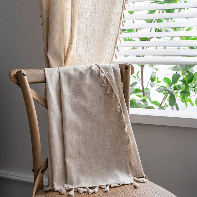 Rideau filtrant la lumière beige à pompons Boho