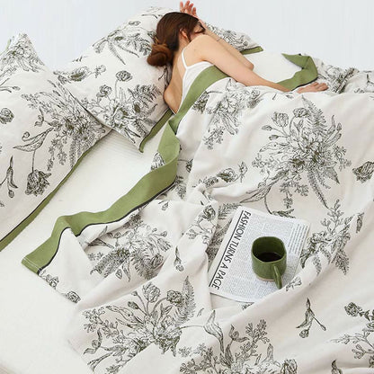 Couette réversible en coton avec fleurs et feuilles pastorales