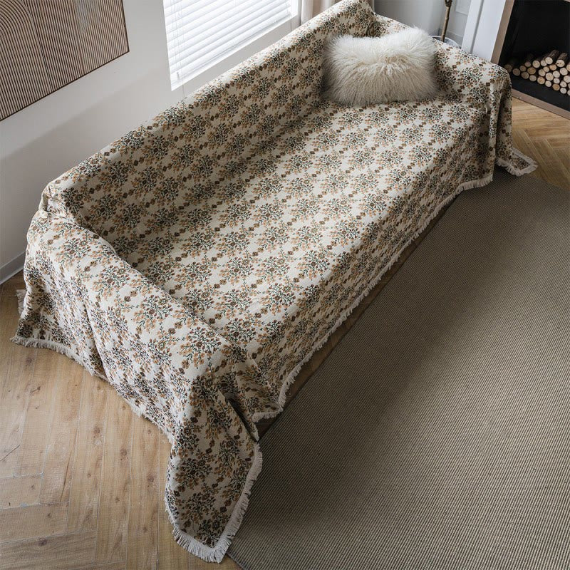 Housse de canapé avec pompon jacquard et motif fleur de prunier