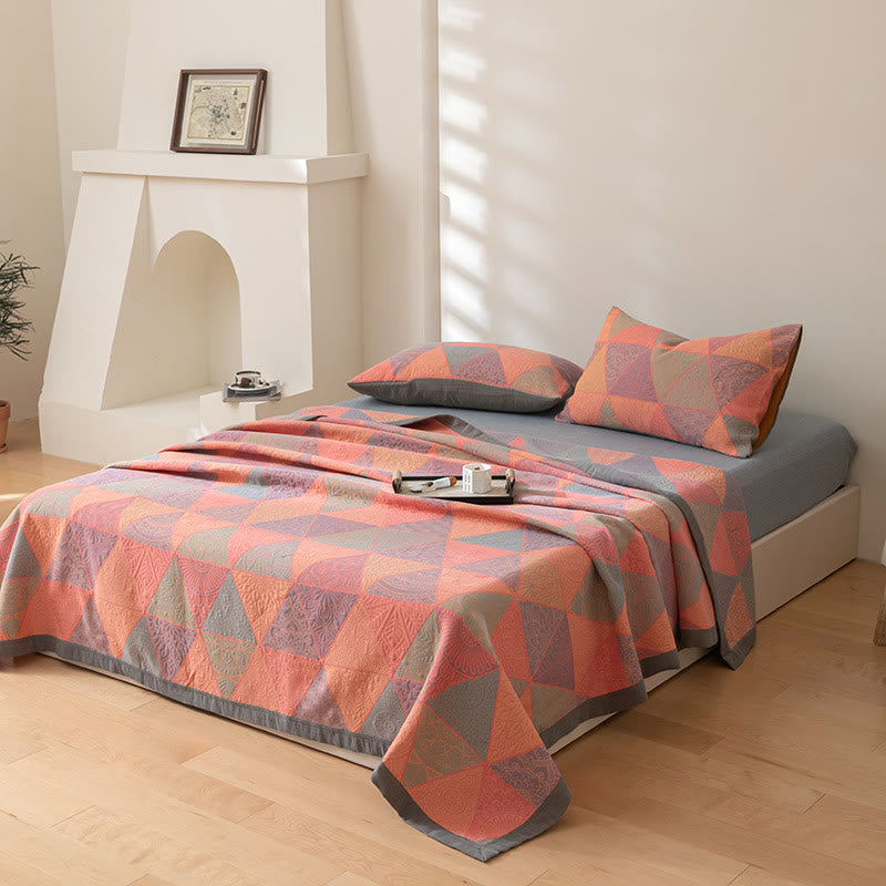 Couette réversible en coton à motif triangulaire