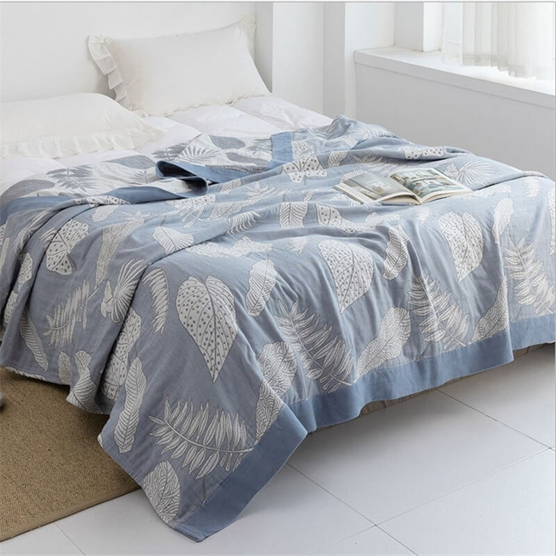 Couverture douce et réversible en gaze de coton à motifs