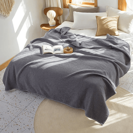 Couette réversible en coton à motif quadrillé uni