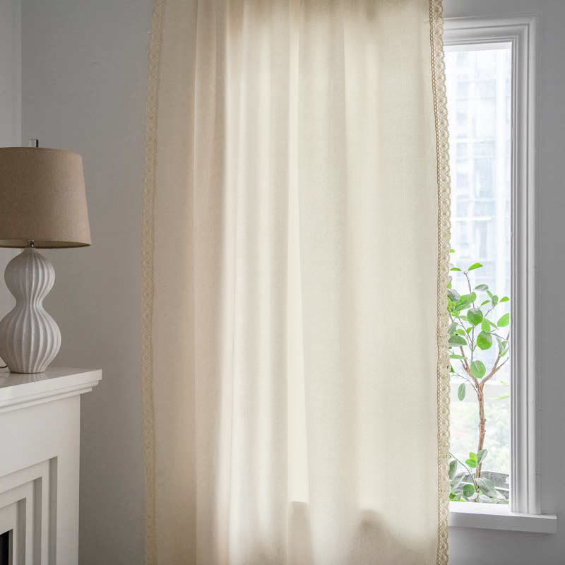Rideau en coton blanc avec ourlet et pompon