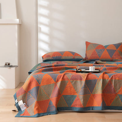 Couette réversible en coton à motif triangulaire